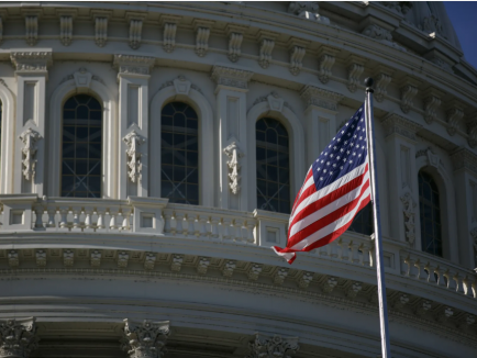 The American flag waves outside of the U.S. Capitol in Washington, D.C. on January 5, 2023 during the 'Jan 6 Justice: Democracy on the Line' rally and press conference, demanding accountability for former President Donald Trump and other officials for the January 6, 2021 Capitol riot, as well as for safe and fair elections. Bryan Olin Dozier via Reuters Connect.